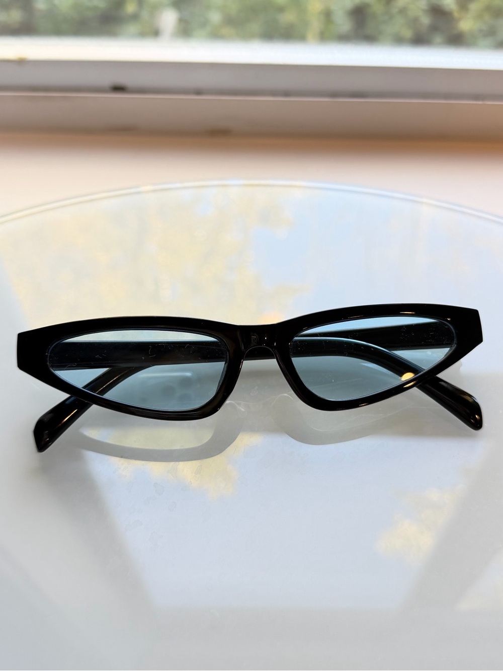 Narrow Y2K blue tinted cat eye sunglasses